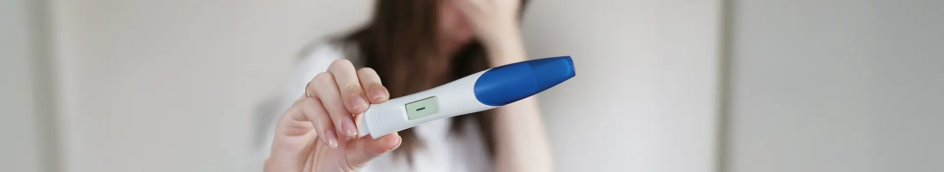 Couple consulting fertility specialist after failed IVF.